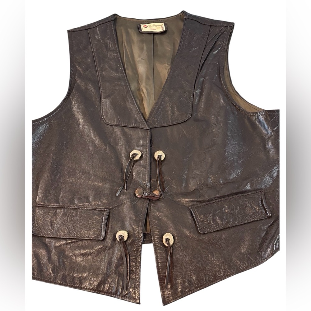 Vintage Dark Brown Leather Vest with Button and Fringe Details large (estimated)